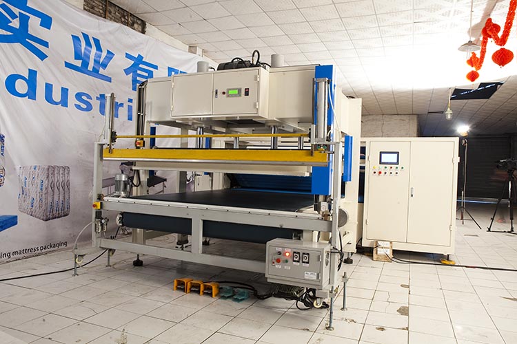 Mattress compress rolling machine
