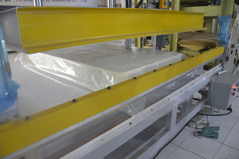 mattress compression packaging machinery